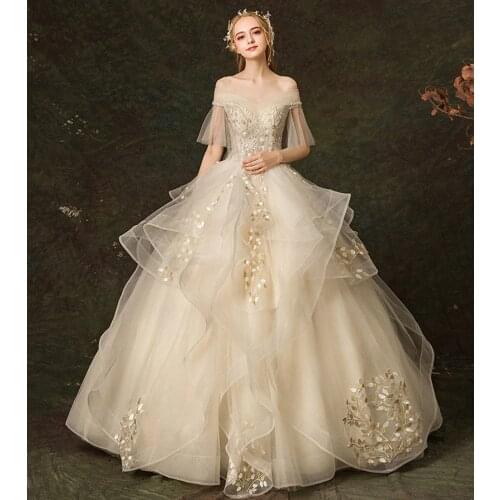 LOVSKYLINE Fashion Luxury Beading Wedding Dress Boat Neck Appliques 2021 New Bridal Dress Novias