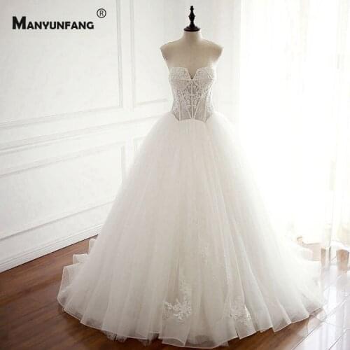 Elegant Strapless Lace Appliques Tulle Sleeveless Bridal Ball Gown Real Photo Backless Chapel Train Embroidery Wedding Dress