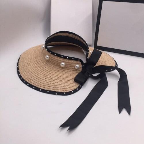 Spring, summer, the new large brim hat fashionable sweet empty lafite grass seaside holiday is prevented bask in sun