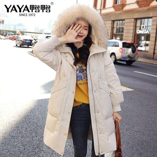 YAYA 2021 Womens Winter White Duck Down Jacket Thick Real Raccoon Fur Collar Medium length Warm Overcoat Hooded Outerwear