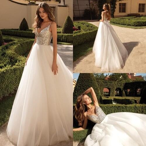 Sexy Sparkling Crystals Wedding Dress Spaghetti Straps V Neck Ball Gown Sweep Train Backless Vestido De Noiva Bridal Dresses
