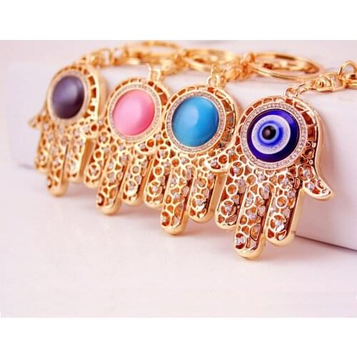 Creative jewelry amulet keychain gift palm car keychain demon eye key ring female bag metal eye drop small gift