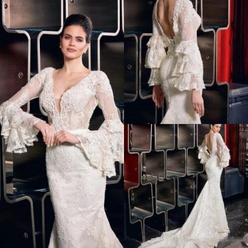 Sexy Backless Bohemian Mermaid Wedding Dresses 2020 Lace Appliques Illusion Long Bell Sleeve V Neck Beach Bridal Gowns