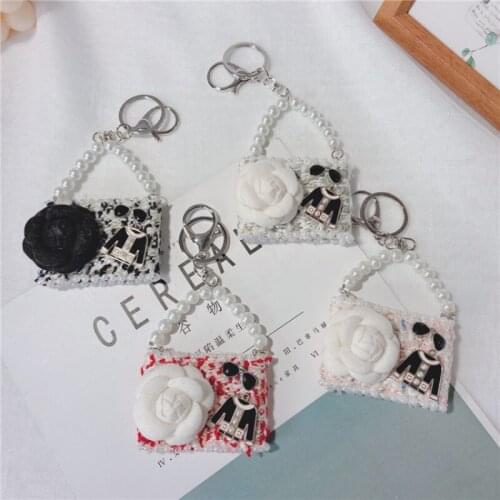 Creative Fashion Ladies Backpack Charm Key Chain Personality Trend Wild Key Chain Fashion Pearl Bracelet Car Pendant Key Chain