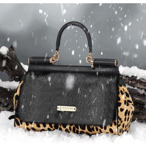 Leopard print hand-held wing bag in autumn and winter 2021 new leather womens bag European and American fur bag shoulder pony m