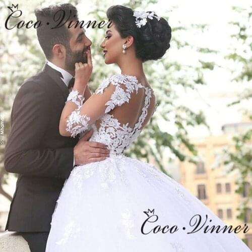Sexy V neck Illusion Back Dubai Wedding Dress Ball Gown Long Sleeves Lace Appliques Princess Bridal Dress Wowen W0497