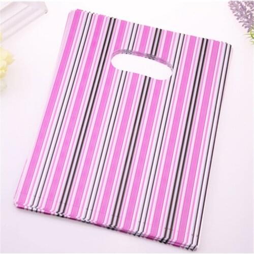 New Design Wholesale 100pcs/lot 20*25cm Luxury Pink Plastic Shopping Bags With Line Medium Clothing Gift Packaging Bags