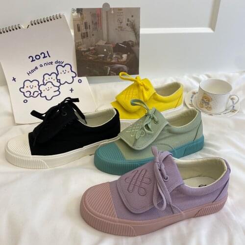 Korean version of Japanese cute simple flat color matching casual shoes 2021 spring and autumn new womens canvas shoes