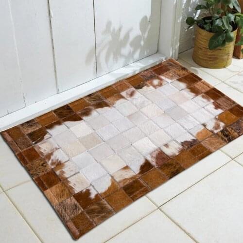 Handmade luxury cowhide seamed small rug 50*80cm modern natrual genuine cowskin semi-circle pattern door mat decoration rug