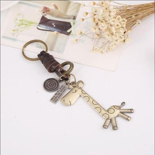2019 NEW Fashion Creative Cartoon Giraffe KeyChain Charms Bag Ornaments Car Key Chain Exquisite Gift Birthday Gift Party Favors