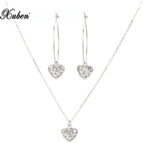 Xuben Stainless steel chain with Hollowing out round Flower Pendant Necklace Ear Studs Suit Chain Jewelry Ornament Jewelry sets