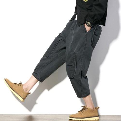 Man loose wide leg jeans pockets ankle- length pants