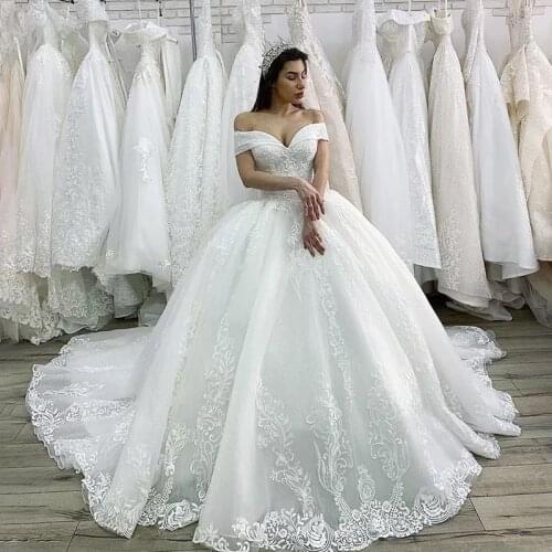 Luxury Beaded Princess Wedding Dress 2021 Lace Appliques Lace up Ball Gown Illusion Bridal Customized Vestido de Noiva