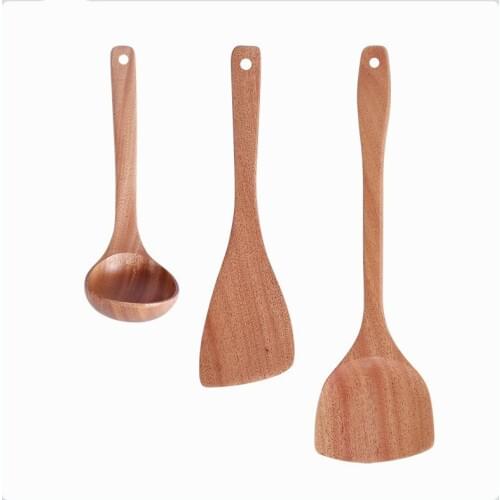 A non-stick pot, a wooden shovel, a wooden spoon, a pear, a wooden pot a Korean cooking shovel a long handle a stir-fried shovel