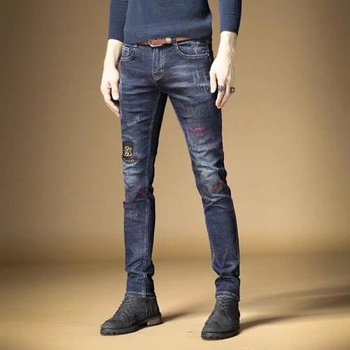 Free shipping new fashion male mens Jeans Embroidered tide brand European American street fashion slim dark blue denim trousers