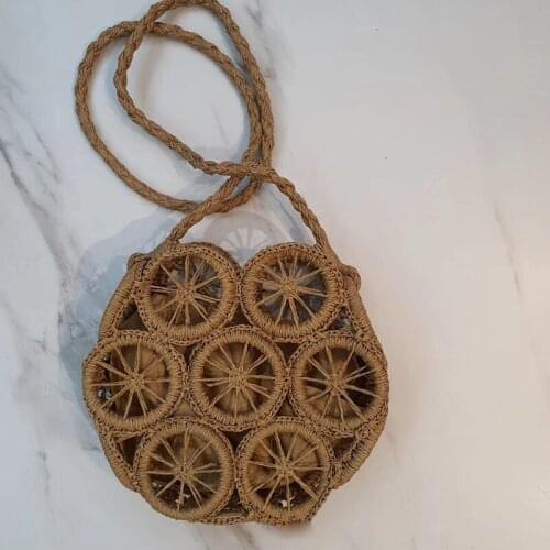 2020 new round hollow paper rope woven bag straddle straw woven bag beach bag leisure Womens bag