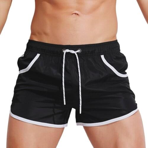 New men sport beach shorts swimming pants Running sports With Pocket Color matching speed dry GYM shorts Summer Swimwear