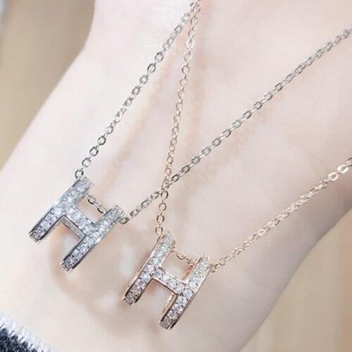 Showfay Womens Korean Letter Necklace Hollow Out Simple Fashion Diamond-Embedded Elegant Pendant Chain Jewelry for Women