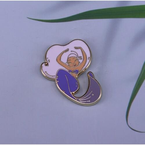 Blue mermaid pin is a perfect addition to a bag or coat to stand out in the crowd
