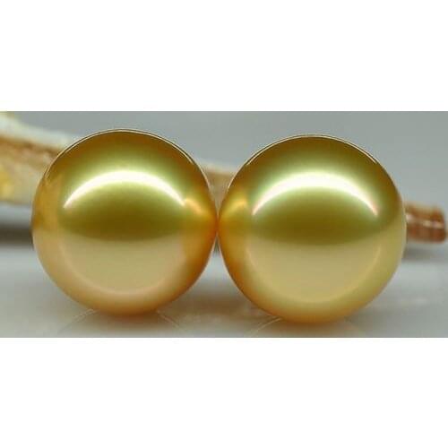 A pair of round AAA natural 10-11 mm south sea gold pearl earrings 14 K gold