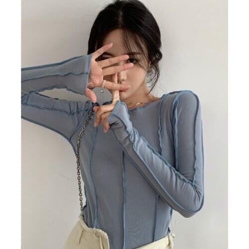 Slim slimming bottoming autumn wild style niche design sense personality stitching round neck top tide