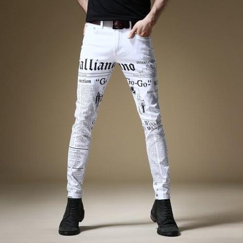 Free shipping new fashion male mens Jeans Slim Newspaper style high street jeans tide brand hip hop white trousers Korean style
