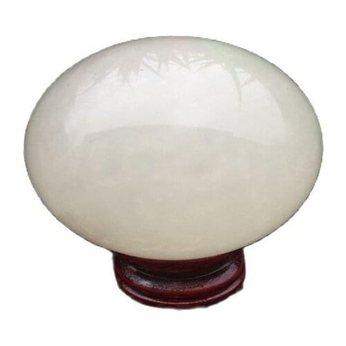 Natural Iceland fluorite pearl stone white light luminous ball ornaments Moonstone fluorescent stone balls