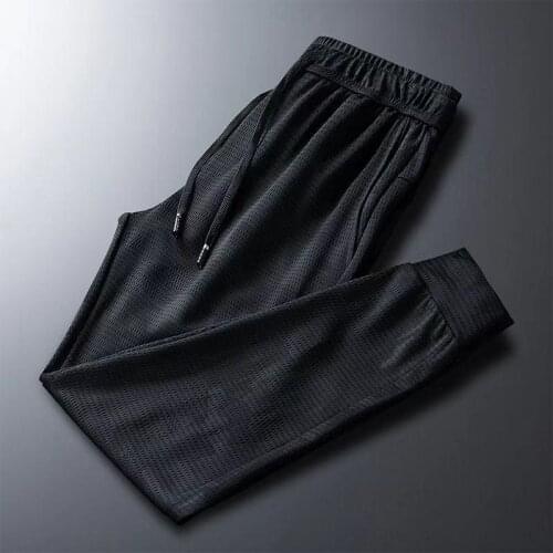 New summer high elastic ice silk pants mens thin breathable loose mesh quick-drying casual sports trousers