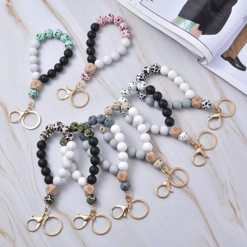 Creative Silicone Charm Bracelet Keychain for Women Fashion Floral Leopard Wristlet Keychain Tassel Bangle Keychain Accessories