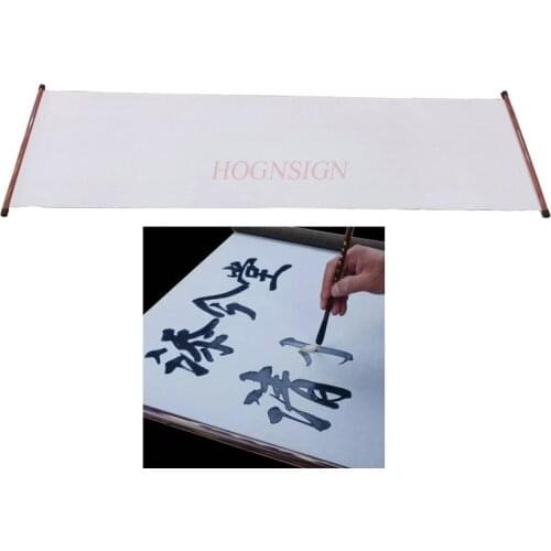 Students present Reusable Chinese Magic Cloth Water Paper Calligraphy Fabric Book Notebook