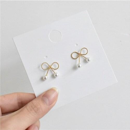 Hot selling Simple Golden Bowknot Pearl Earring with Hypoallergenic Needle Fashion Jewelry Stud Earrings for women