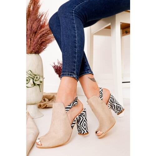 Chloe Heels Mink Sheepskin Rug with Shoes in Detail