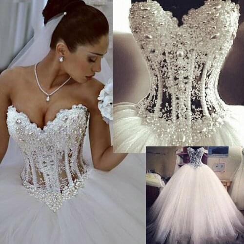 Hot Sale Wedding Dresses Lace Pearl Beads Unique Arabic Bridal Gowns Sweetheart Neck Zip Back White Tulle Princess Wedding Gowns
