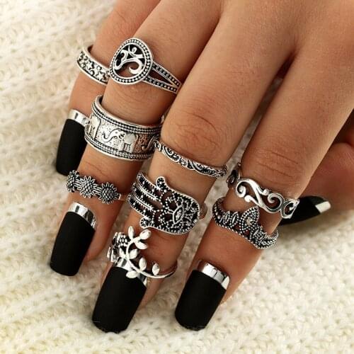Pack of 9 creative vintage knuckle rings with carved flower /palm/crown and elephant design