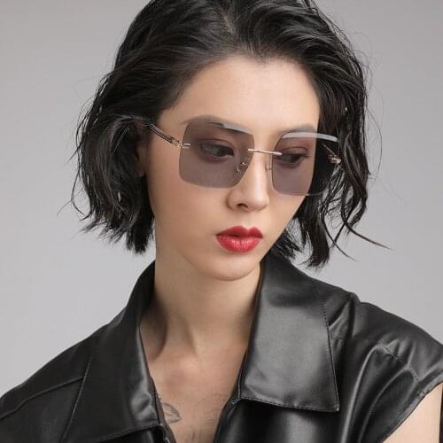2020 New Fashion Net Red Same Style Sunglasses Women Fashion Frameless Trimming Sunglasses Ms. Sunglasses 6131 Sunglasses