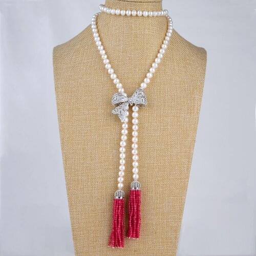 42" White Pearl Bowknot Tassel Necklace CZ Pendant
