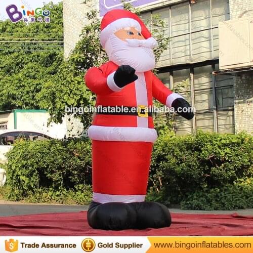 Customized 1.8 meters tall inflatable christmas wave santa hot sale inflatable christmas old man for display toys