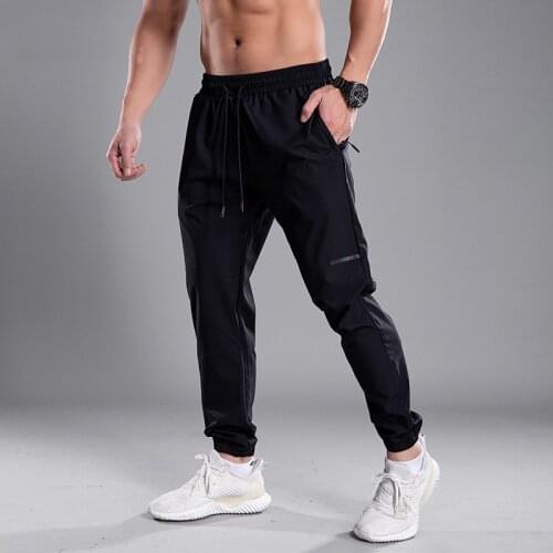 Men Jogging Pants GYM Training Pants Sportswear Sports Pants Mens Running Swearing Jogging Sport Pants With Zipper Pockets 1