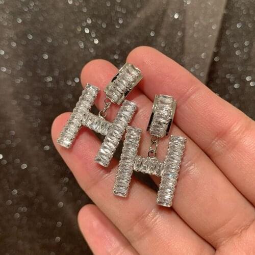 Super flash Zircon Earrings are sweet, thin, round face, exaggerated and elegant letters earrings