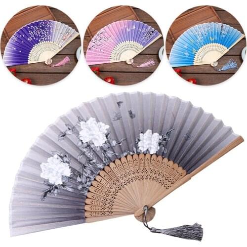 Fan folding fan Chinese style ancient style womens tassels summer portable folding childrens dance classical Hanfu small fan