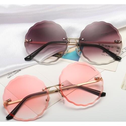 Vintage Round Sunglasses Women Men 2020 Fashion Rimless Glasses Retro Pink Sun Glasses Women UV400 Shades Oculos