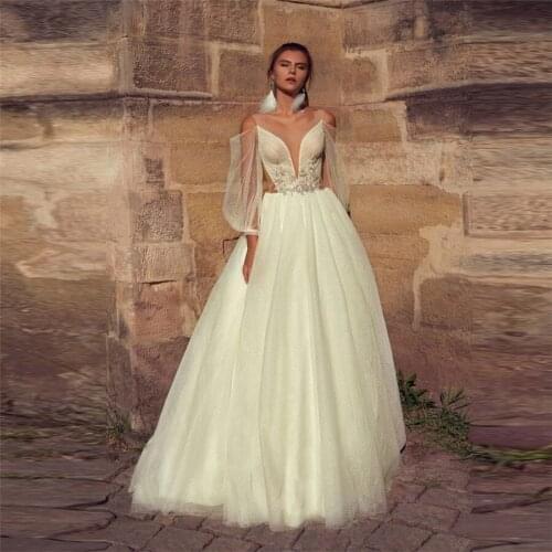 Sheer Scoop Lace Long Sleeves A-Line Wedding Dresses Bridal Gowns Custom Made Spring Robe De Mariee Beading With Feather