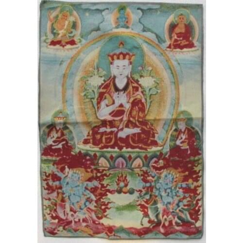 Golden silk embroidery thangka Buddha in Tibet and Nepal