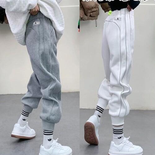 European station 2021 spring new womens fashion luminous strips plus velvet feet pants all-match elastic waist casual pants