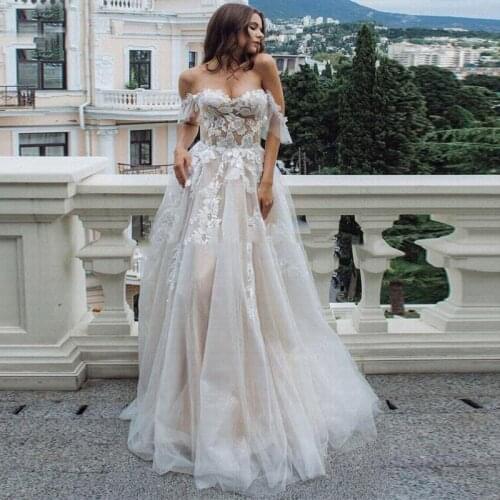 2021 New Wedding Dresses Off Shoulder Lace Appliques A Line Bridal Gowns Custom Made Sexy Backless Sweep Train Wedding Dress