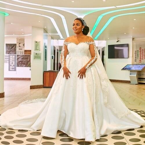 Luxury Lace Beads Cathedral Train African Wedding Dress 2020 Robe De Mariee Romantic Long Sleeve Illusion Back Wedding Gowns