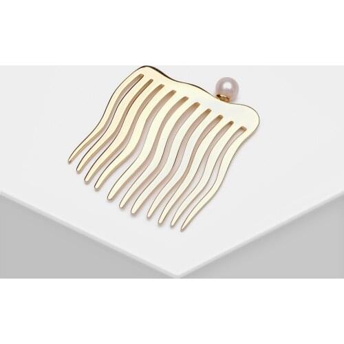 Amorita boutique Fashionable wave pearl hairpin
