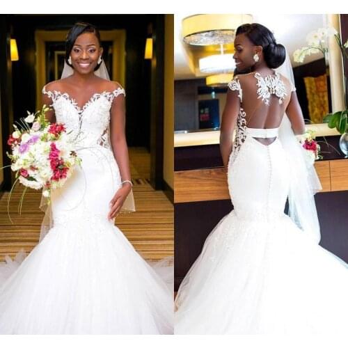 Robe de mariée African Mermaid Wedding Dresses Sexy Backless Lace Black Girl Applique Sweep Bohemian Sheer Neck Bridal Gown