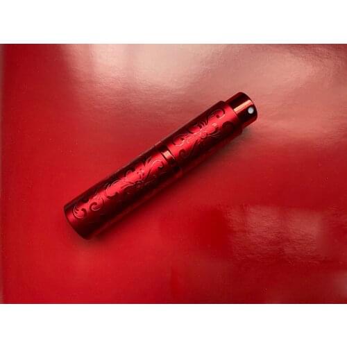 Nbyaic100pcs Embossed rotating perfume bottle, detachable glass lining 10ml portable high-grade red perfume sprayer empty bottle