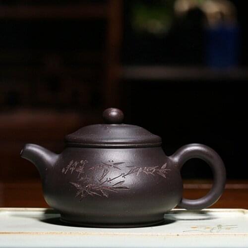 Yixing teapot wholesale famous carving painting all hand pot pan recommended undressed ore kingbox kung fu tea set
